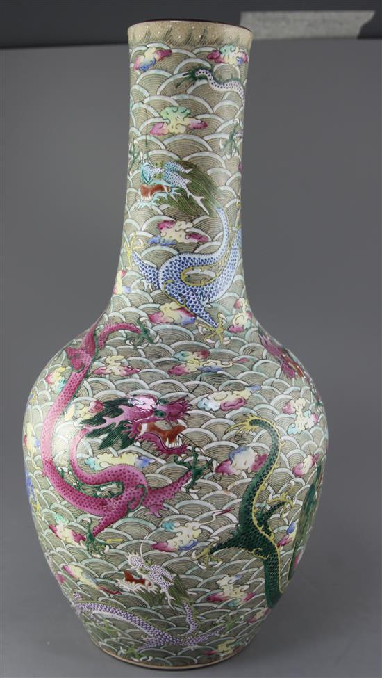 A large Chinese famille rose enamelled dragon bottle vase, late 19th century, height 54.5cm